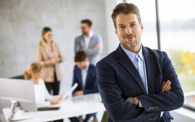 handsome-young-business-man-standing-confident-office-front-his-team