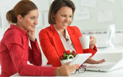 young beautiful and emotional businesswomen working in modern office